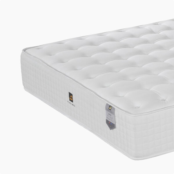 Pure Bed vzmetnica NATUR – produktna fotografija, pogled na vogal z etiketo.